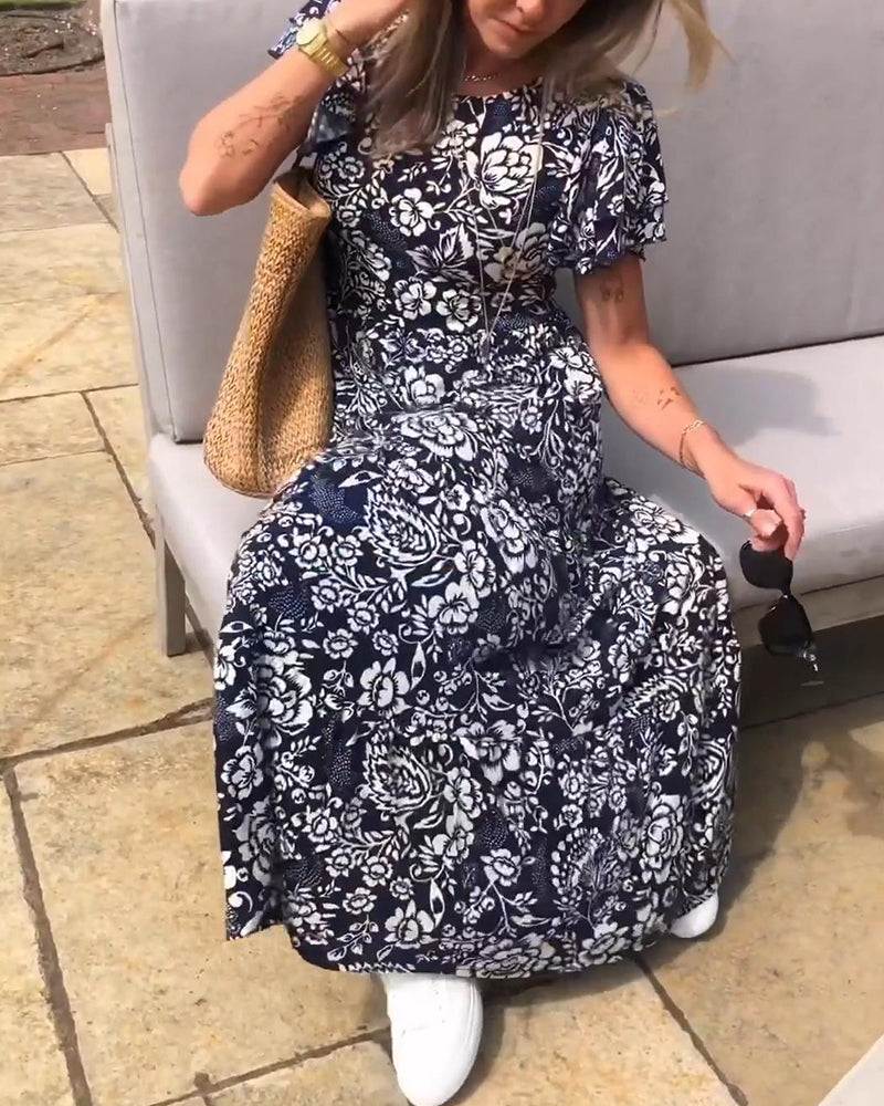 Lange jurk met korte mouwen en bloemenprint