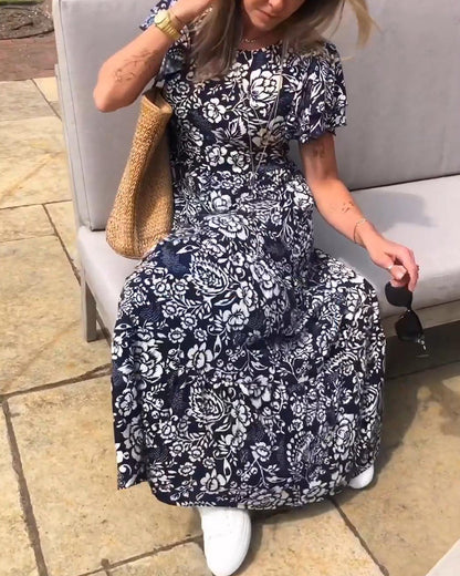 Lange jurk met korte mouwen en bloemenprint