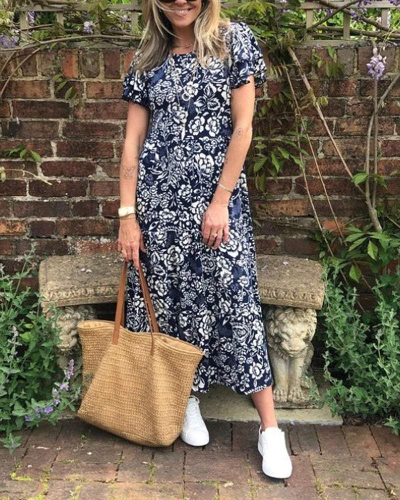 Lange jurk met korte mouwen en bloemenprint