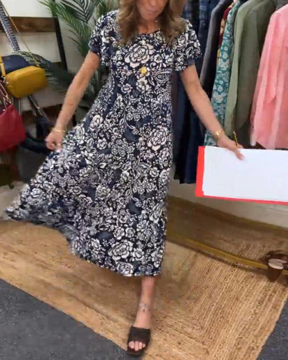 Lange jurk met korte mouwen en bloemenprint