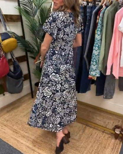 Lange jurk met korte mouwen en bloemenprint