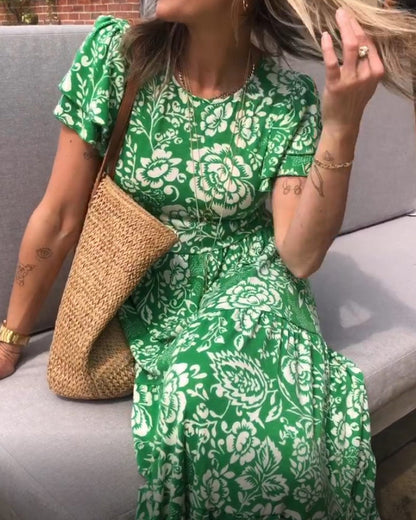 Lange jurk met korte mouwen en bloemenprint